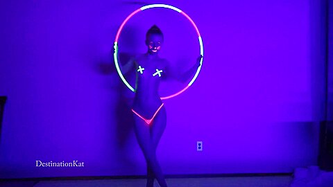 Dances And Hula Hoops Under A Black Light - free porn video