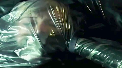 Latex Breathplay :: Blonde woman gags herself with plastic sheeting - free porn video